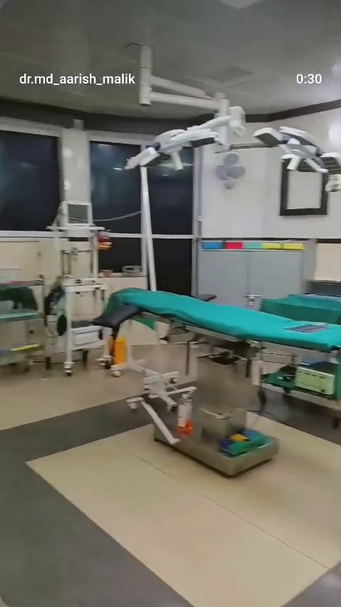 Original operating-theatre frame from the supplied hospital video